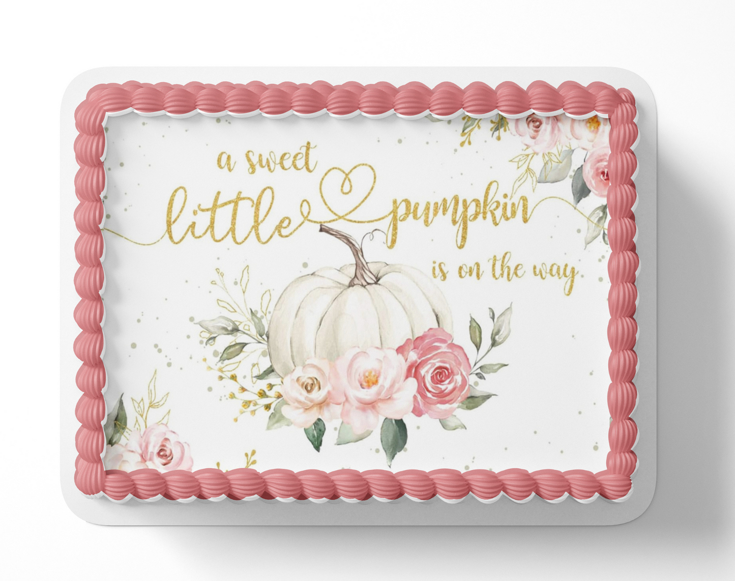 Baby shower cake with pumpkins, flowers, and text 'a sweet little pumpkin is on the way' on a white background.