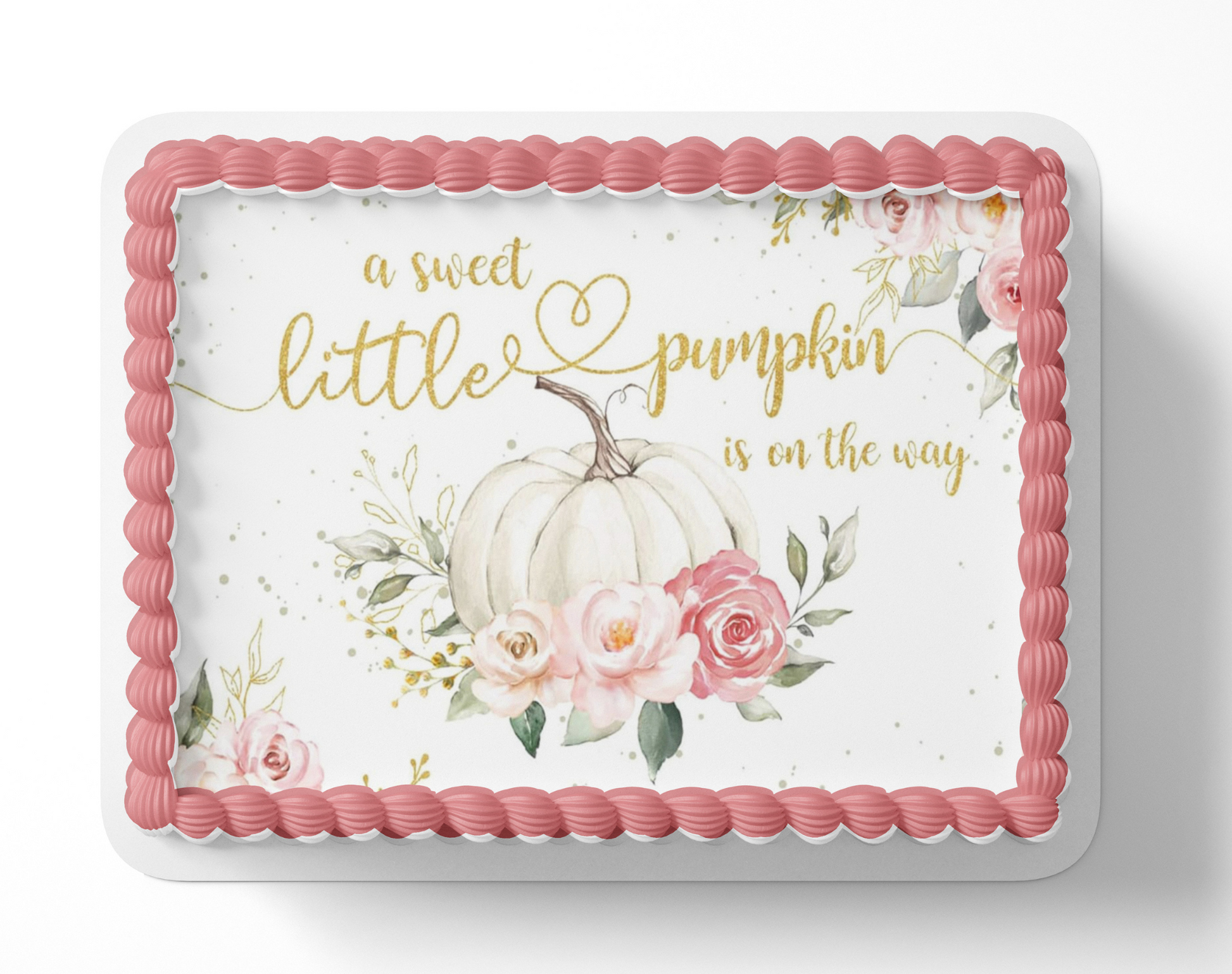 Baby shower cake with pumpkins, flowers, and text 'a sweet little pumpkin is on the way' on a white background.