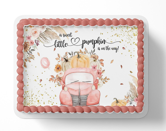 Baby shower cake with pink vintage pickup truck, pumpkin, and floral design on a white cake