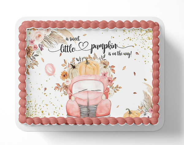 Baby shower cake with pink vintage pickup truck, pumpkin, and floral design on a white cake