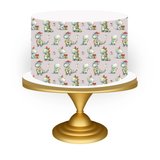 Decorative cake with dinosaur pattern on a white background