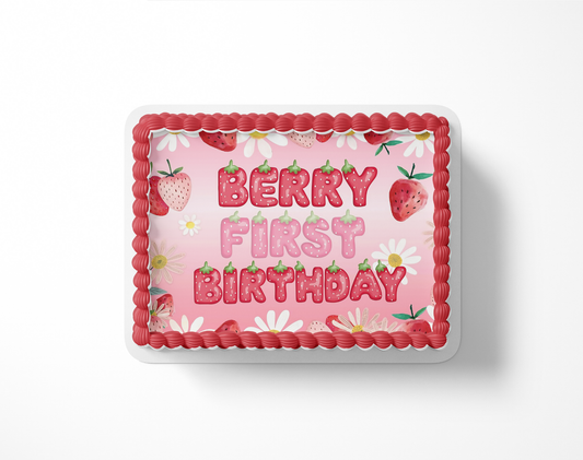 Birthday cake with 'Berry First Birthday' text and strawberry design on a white background